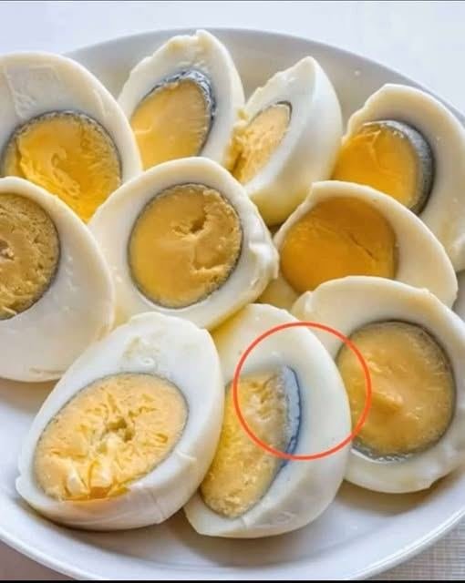 Why does a green ring appear around hard-boiled eggs?